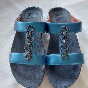 FitFlop Fino Sparkle Slide Sandals in a metallic teal color Size US7